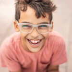 boy wearing glasses at the dentist